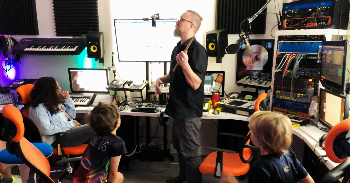 Travis teaching a music production class